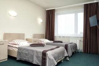 Отель IT Time Hotel Минск Трехместный номер - Доступ для гостей с ограниченными физическими возможностями-8
